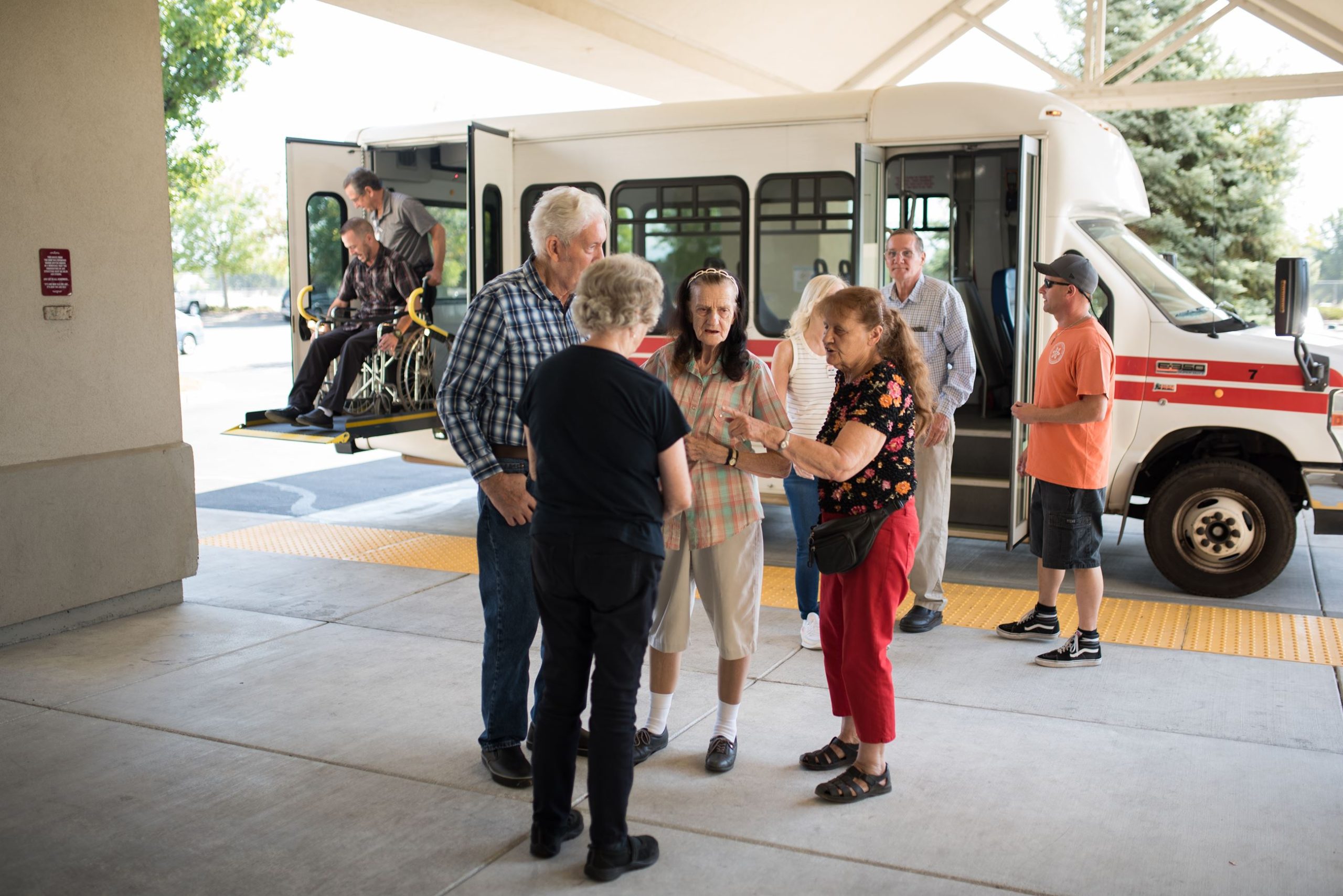 Seniors in front of Dignity Health bus